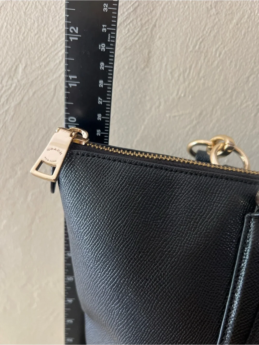 Coach sleek leather